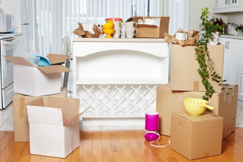 Business movers handling furniture during a Stockwell office move
