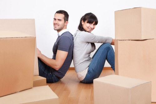 Trained moving staff carrying furniture safely during a Stockwell relocation