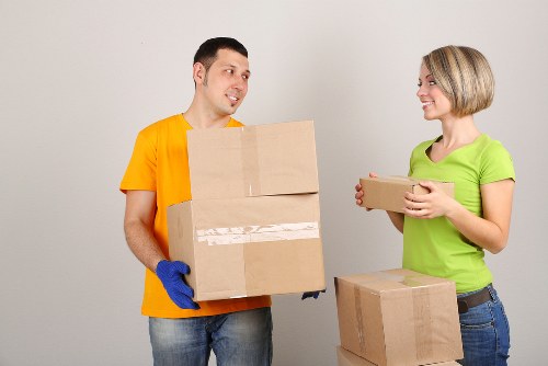 Professional movers loading items for a student move in Stockwell