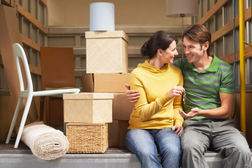Professional movers handling furniture during a Stockwell relocation